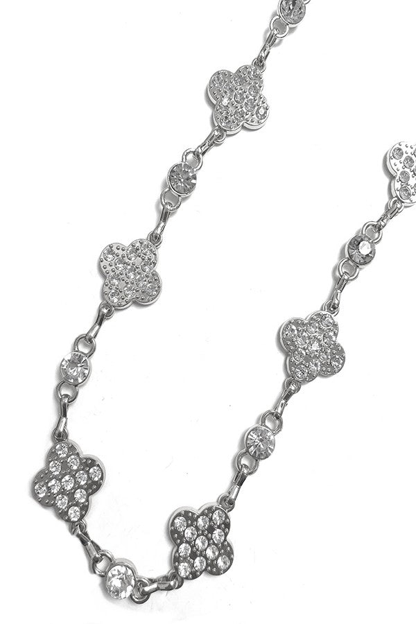 Flower shape rhinestone chain belt with lobster claw clasp and extender, showcasing elegant design and sparkling details.