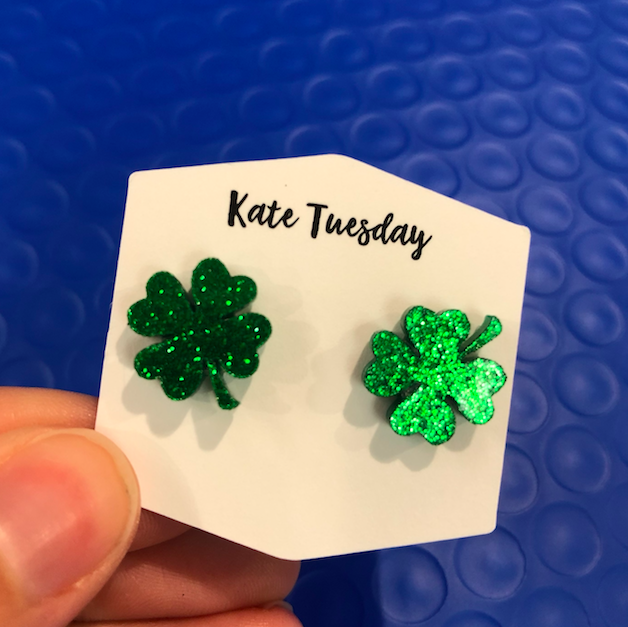 Glitter Acrylic St. Patties Day Clover Earrings featuring a sparkling four-leaf clover design, perfect for festive celebrations.