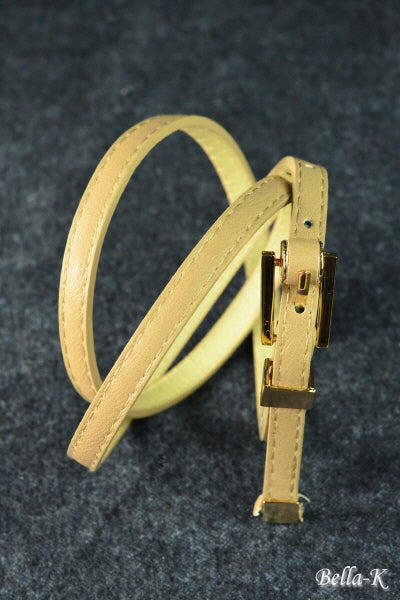 Gold Buckle Belt made of simulated leather with gold-tone hardware, featuring five adjustable holes for a perfect fit.