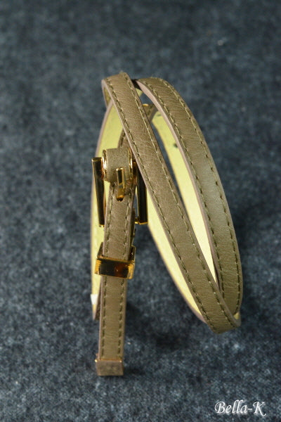 Gold Buckle Belt made of simulated leather with gold-tone hardware, featuring five adjustable holes for a perfect fit.