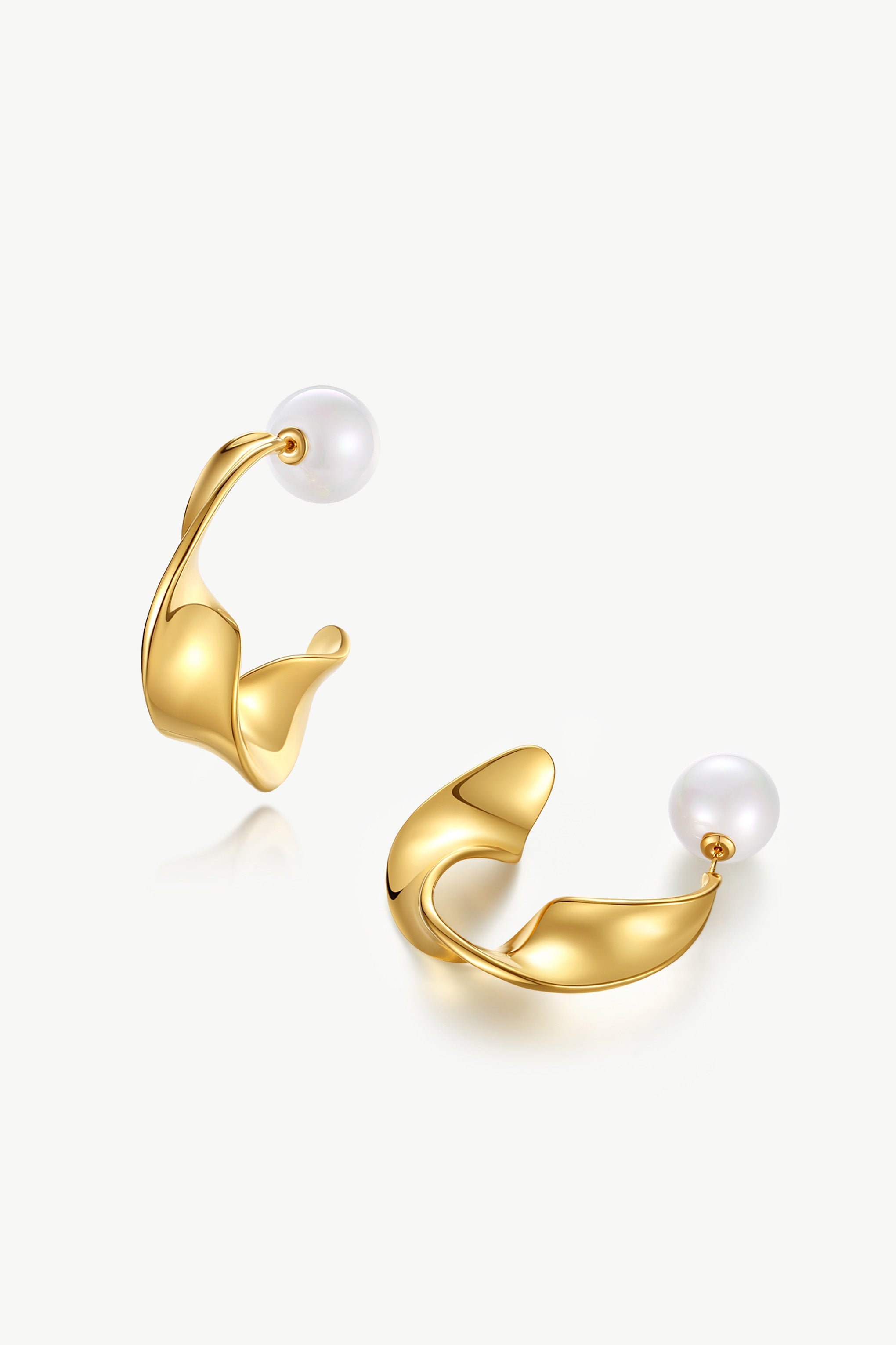 Gold Chunky Wave Hoop Earrings featuring a unique waved design and pearl accents, perfect for any occasion.