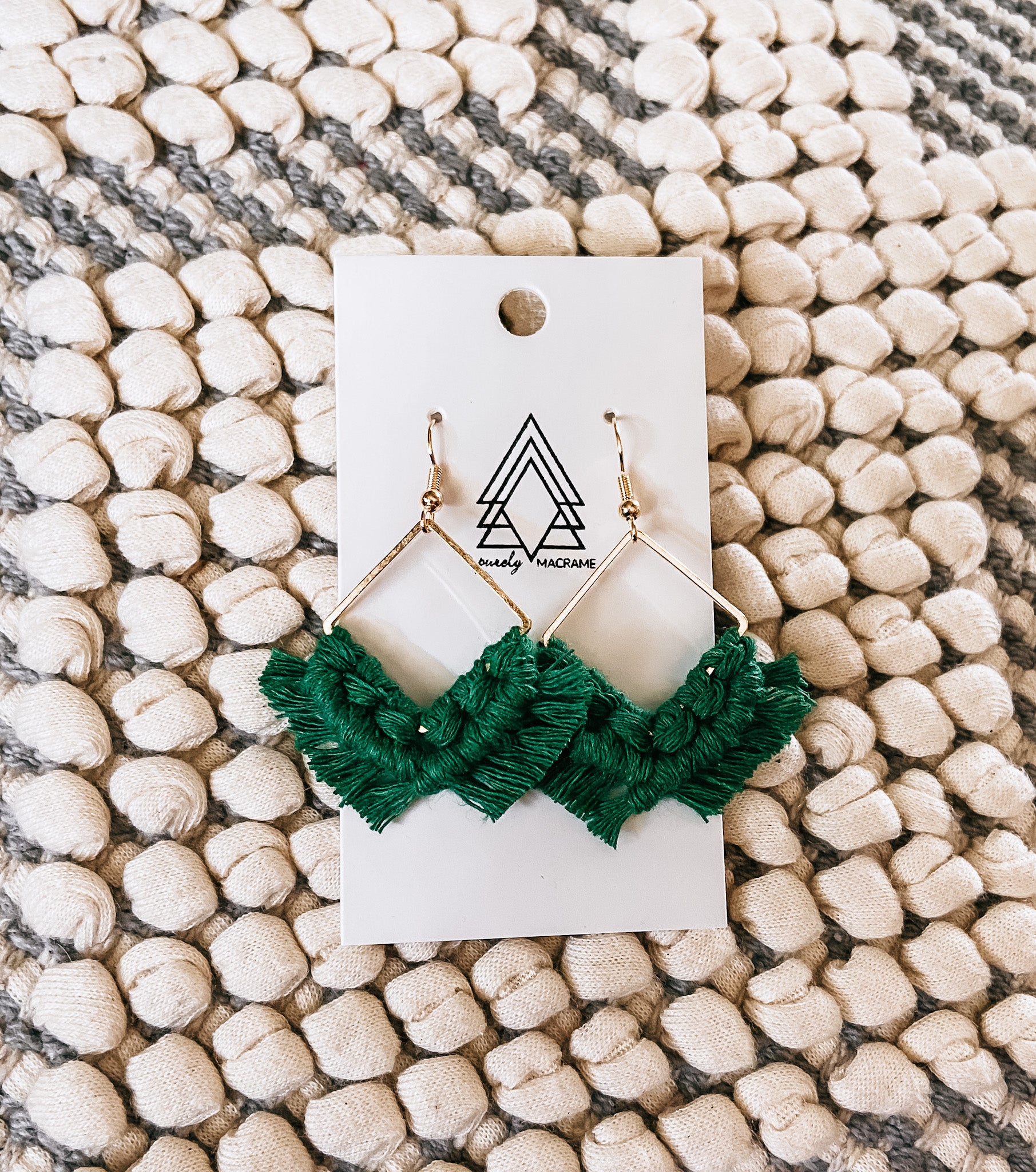 A pair of elegant Gold Diamonds earrings made from 100% macrame cotton, showcasing their lightweight design and assorted colors.