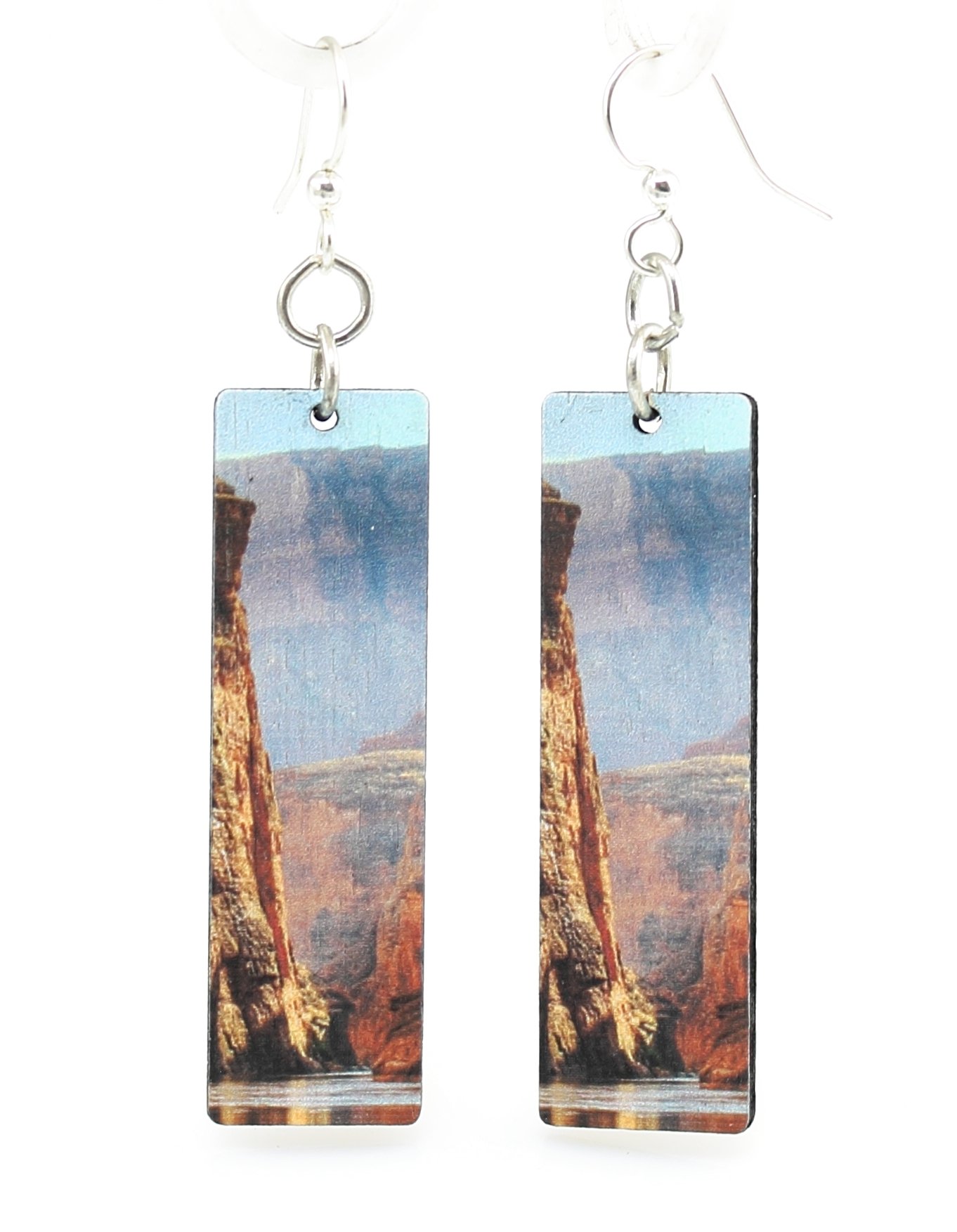 A pair of Grand Canyon Wood Earrings, showcasing intricate laser-cut designs made from sustainably sourced wood, with silver-finished stainless steel ear wires.