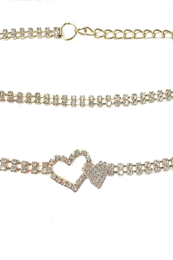 A stylish Heart Crystal Chain Belt featuring a sparkling heart design and a lobster claw clasp, perfect for enhancing any outfit.