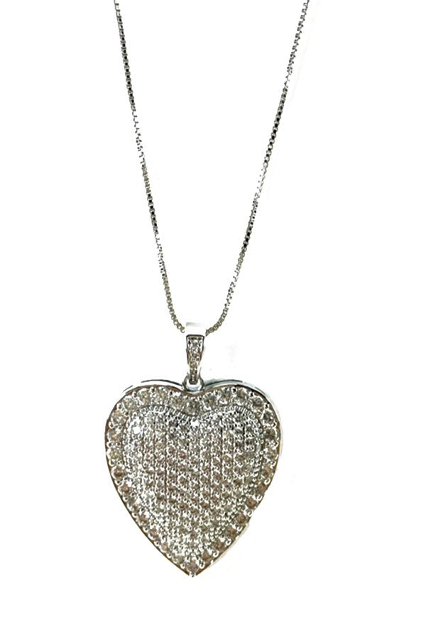 A beautiful heart pendant necklace featuring cubic zirconia stones, double plated finish, and a lobster claw clasp with extender.