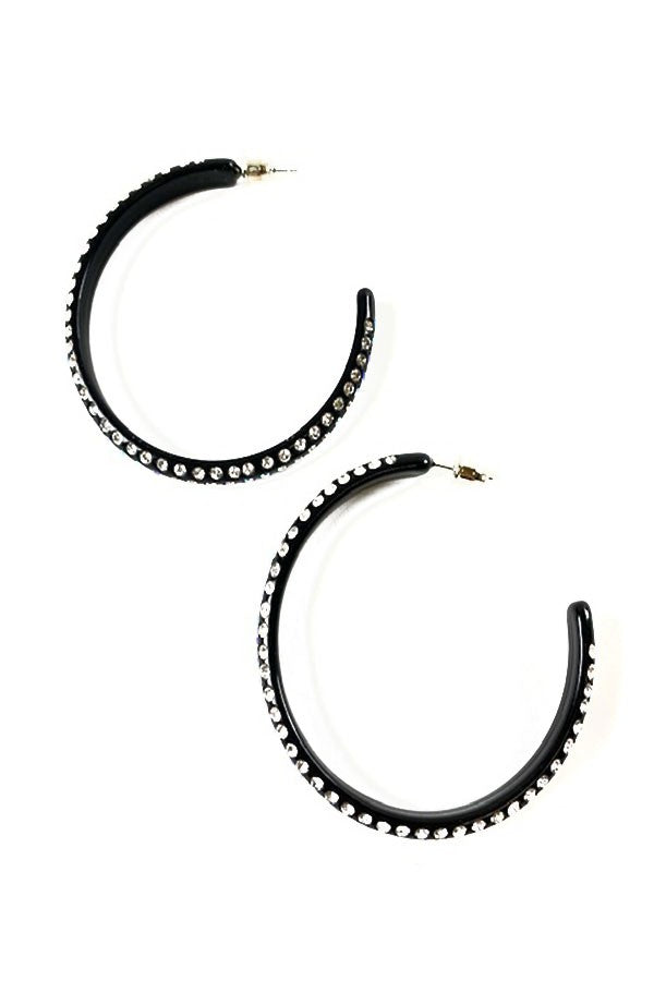 Acrylic clear rhinestone hoop earrings with a diameter of 2.25 inches, featuring a secure post back closure.