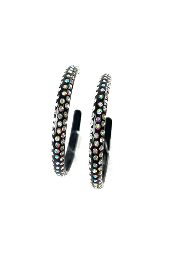 Acrylic clear rhinestone hoop earrings with a diameter of 2.25 inches, featuring a secure post back closure.