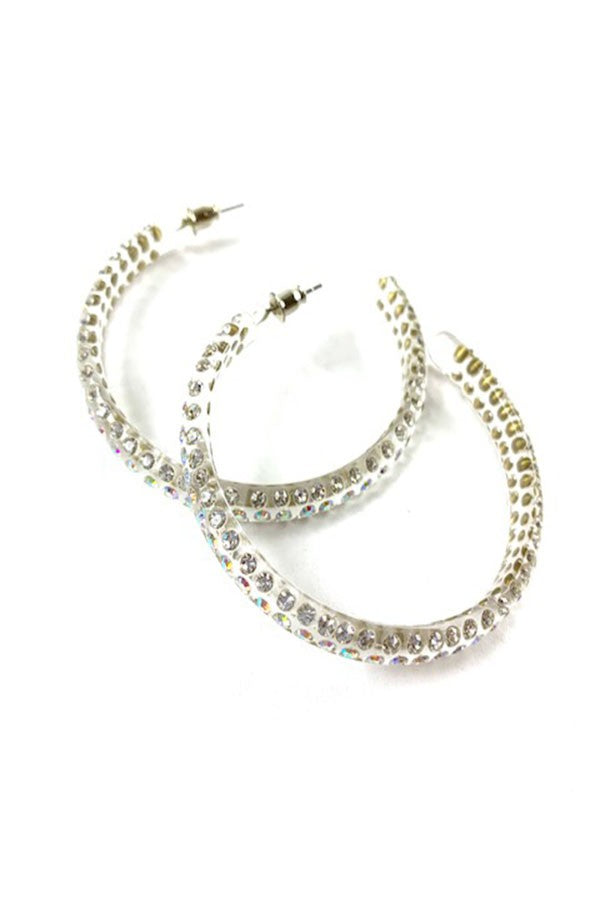 Acrylic clear rhinestone hoop earrings with a diameter of 2.25 inches, featuring a secure post back closure.