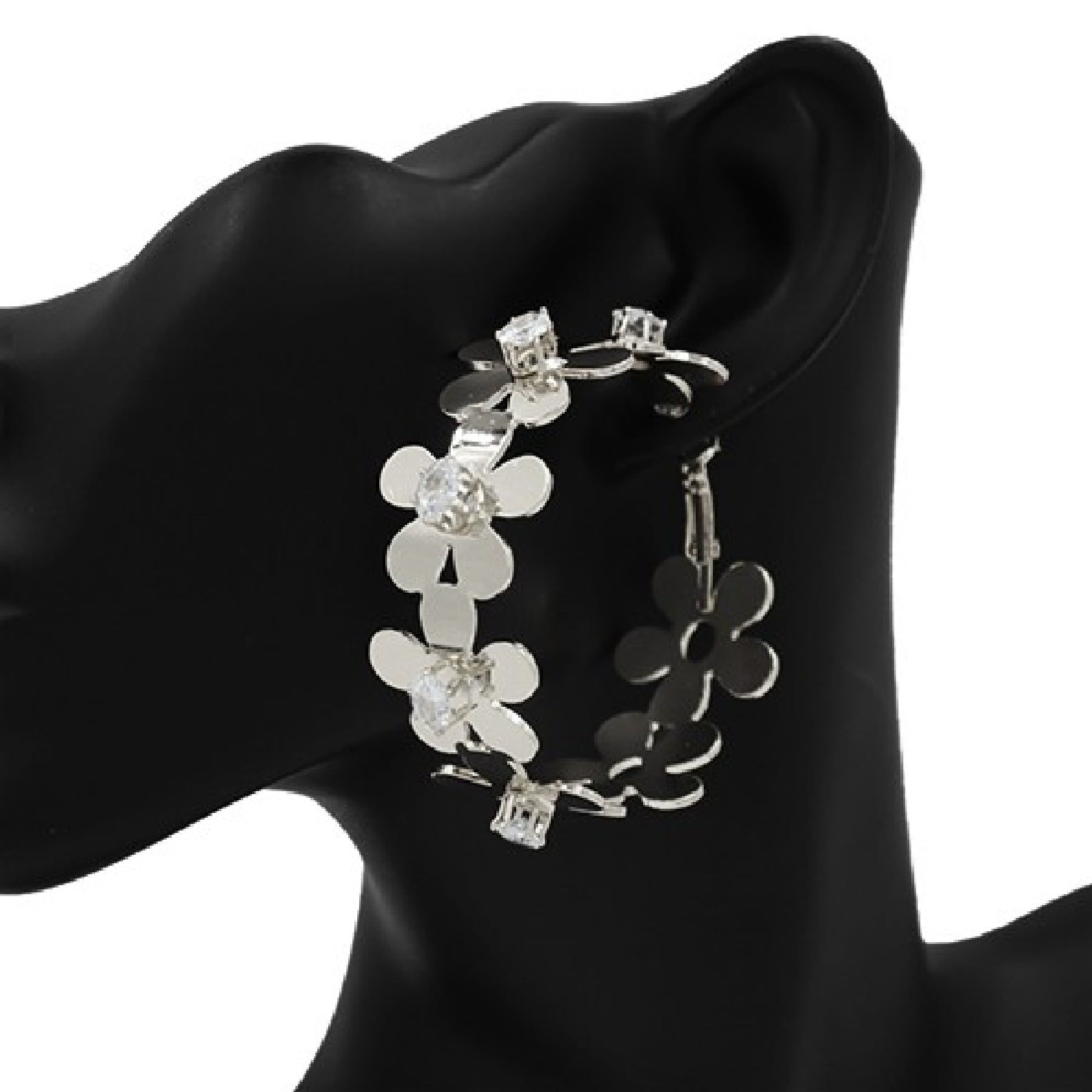 Elegant hoop earrings featuring linked flowers and sparkling stones, showcasing a stylish design.