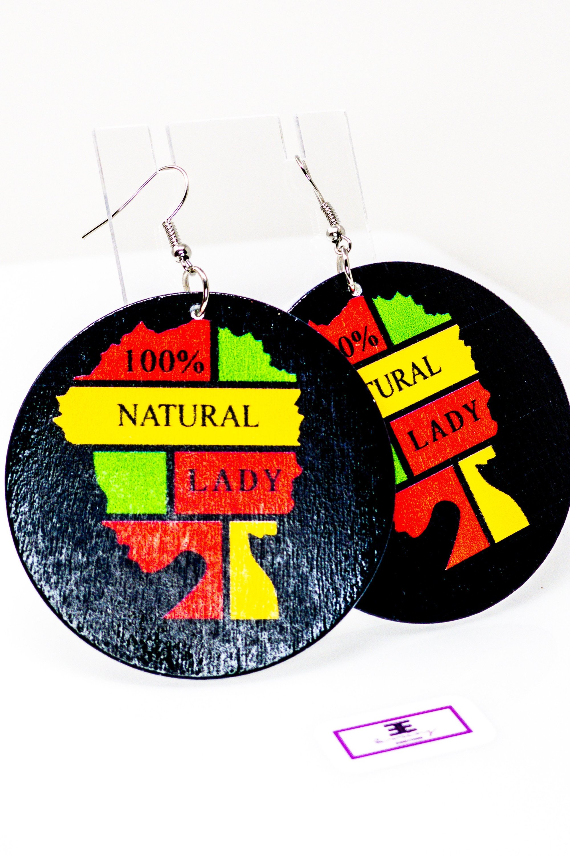 A pair of 100% natural wooden hoop drop earrings in vibrant colors, showcasing a unique front and back print design.