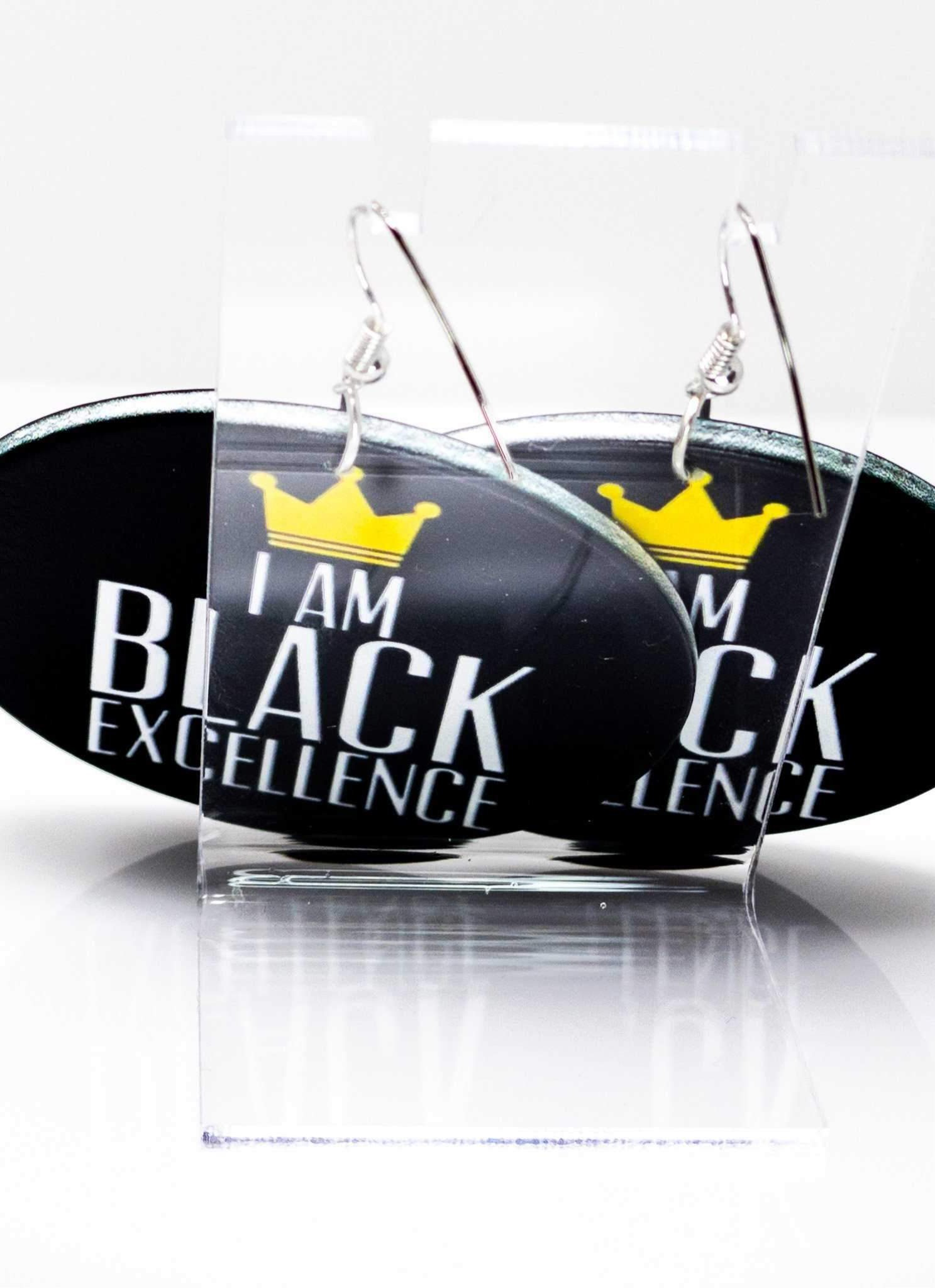 Handcrafted Black Excellence Hoop Earrings made from wood with brass ear hooks, showcasing a stylish and cultural design.