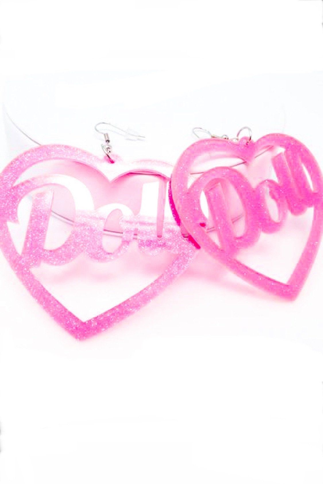 Hoops Doll Earrings featuring a vibrant pink color and sparkle drop design, made from high-quality acrylic.