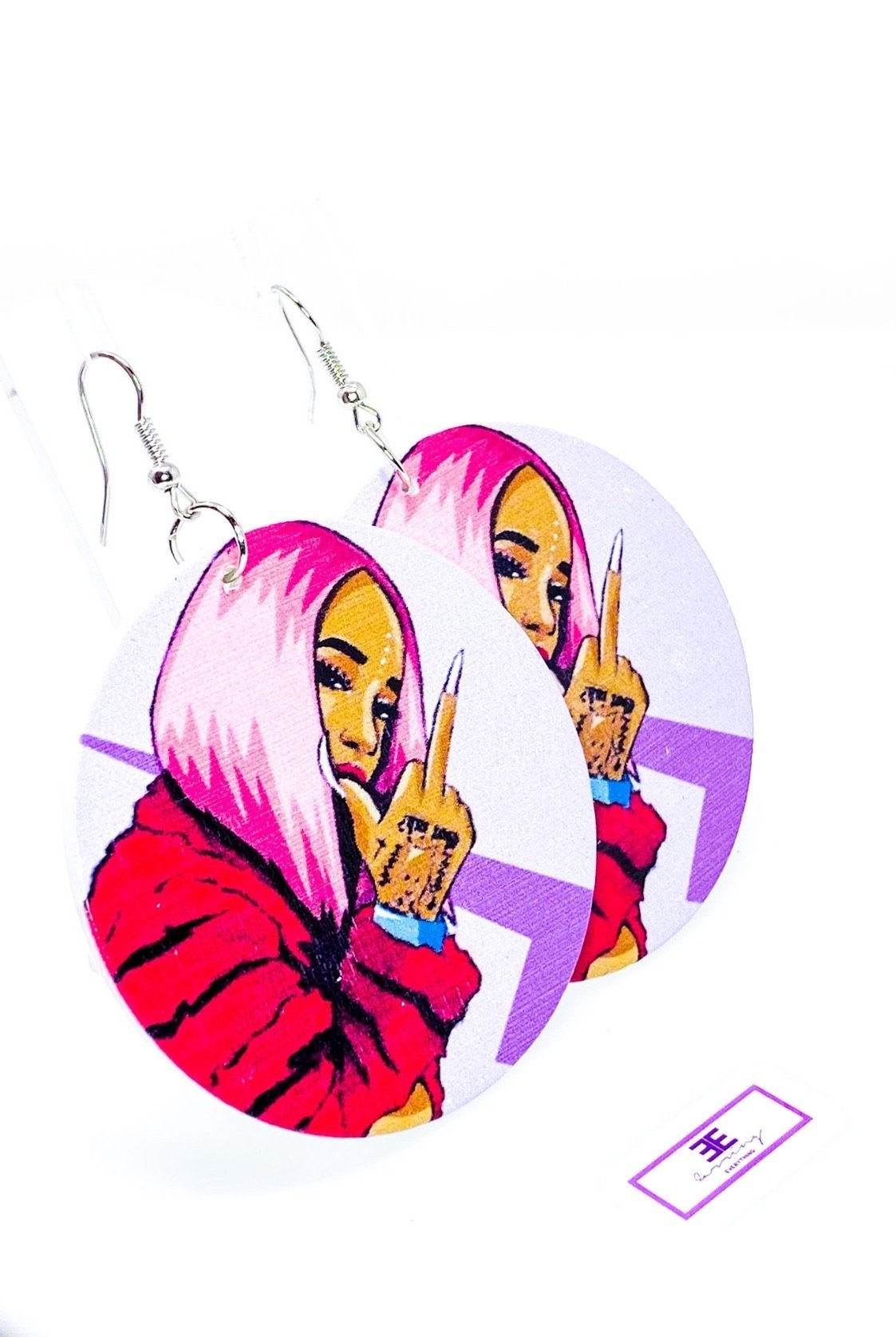 Handmade wooden hoop earrings in pink, purple, and fuchsia colors, featuring nickel-free brass ear hooks.