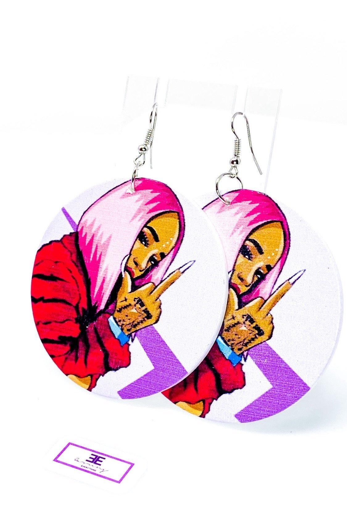 Handmade wooden hoop earrings in pink, purple, and fuchsia colors, featuring nickel-free brass ear hooks.