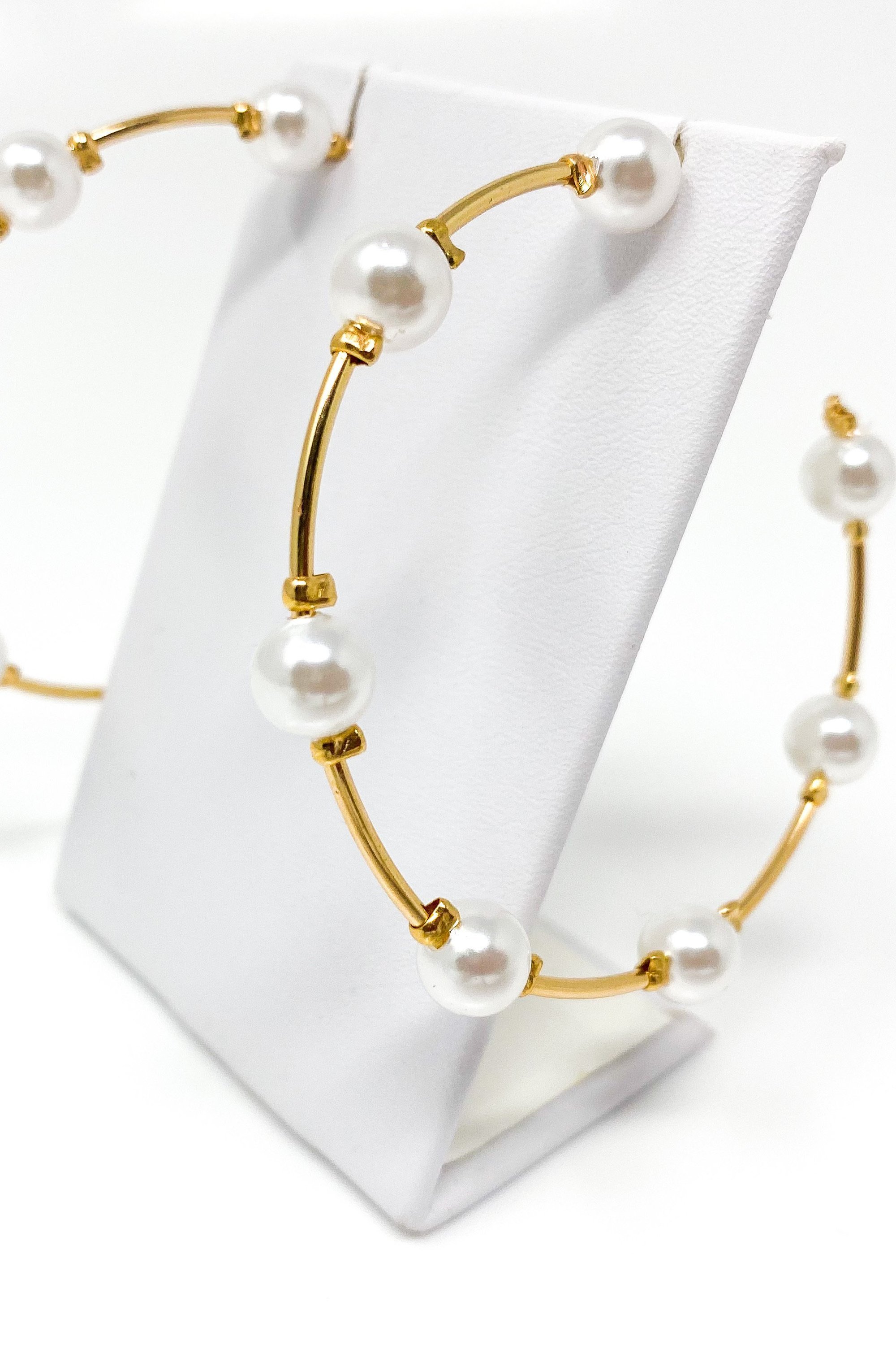 Elegant Upper Echelon Pearl & Gold Hoop Earrings made from high-quality zinc alloy, featuring a luxurious design suitable for any occasion.