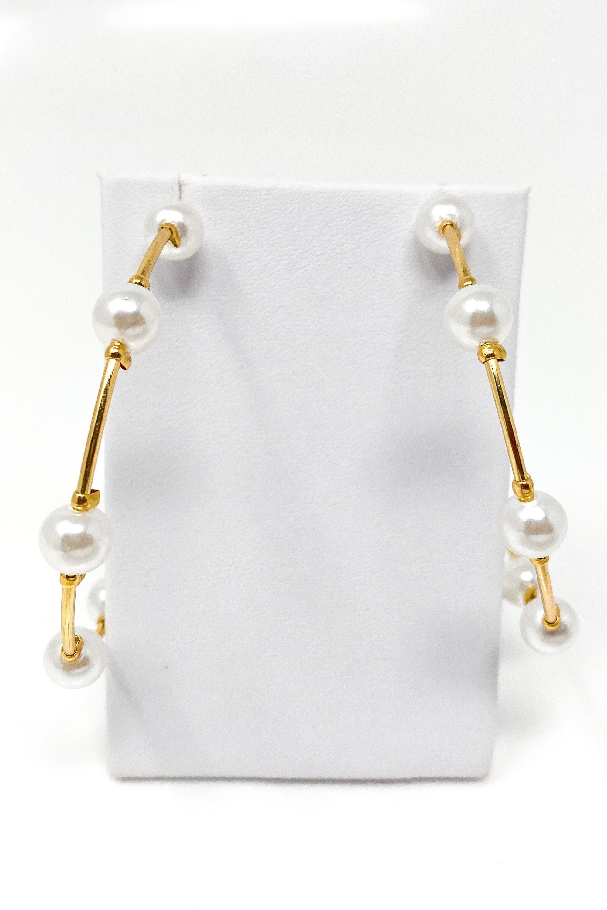 Elegant Upper Echelon Pearl & Gold Hoop Earrings made from high-quality zinc alloy, featuring a luxurious design suitable for any occasion.