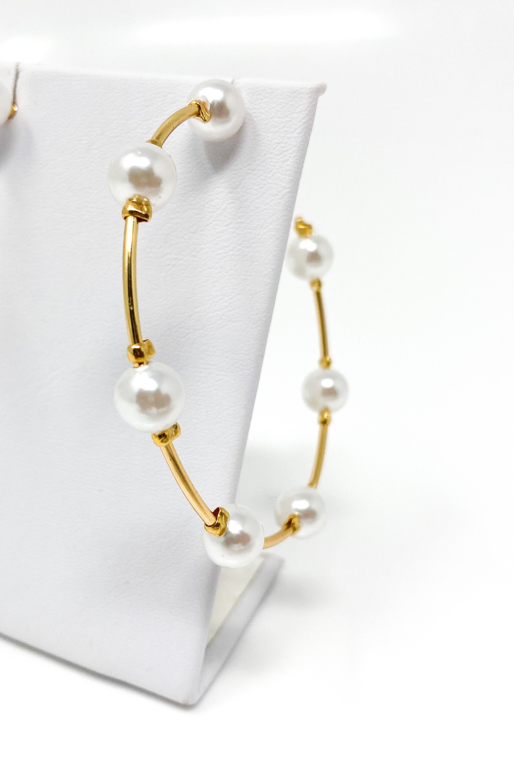 Elegant Upper Echelon Pearl & Gold Hoop Earrings made from high-quality zinc alloy, featuring a luxurious design suitable for any occasion.