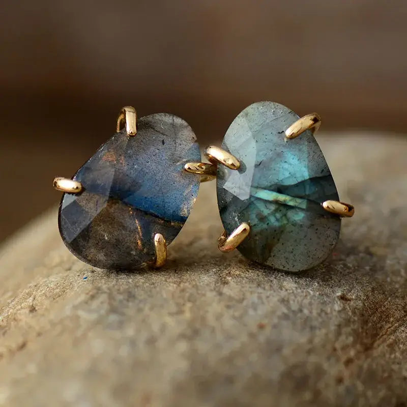 A pair of handmade Labradorite stud earrings featuring iridescent semi-precious stones, perfect for bohemian style.