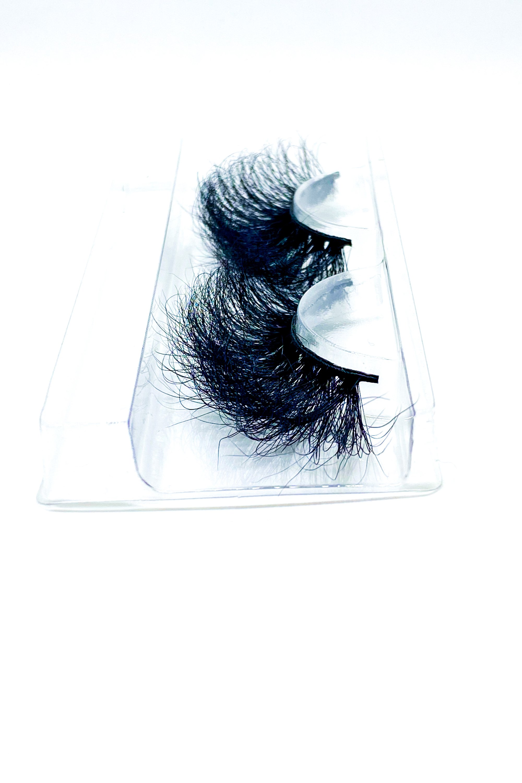 Lash Bae Boom Kack Pow 25mm Mink Strip Lashes, showcasing their voluminous and handmade quality.