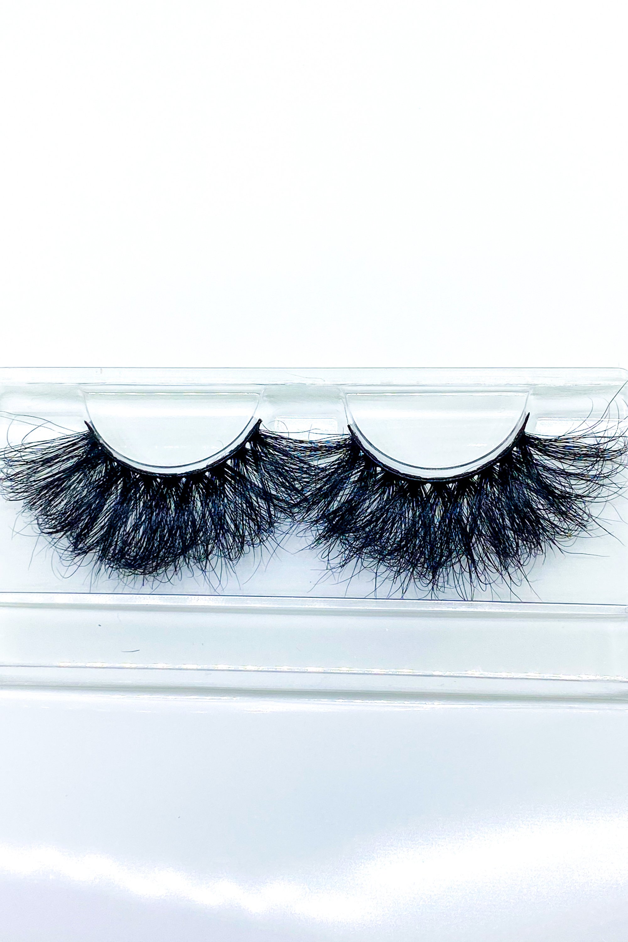 Lash Bae Boom Kack Pow 25mm Mink Strip Lashes, showcasing their voluminous and handmade quality.