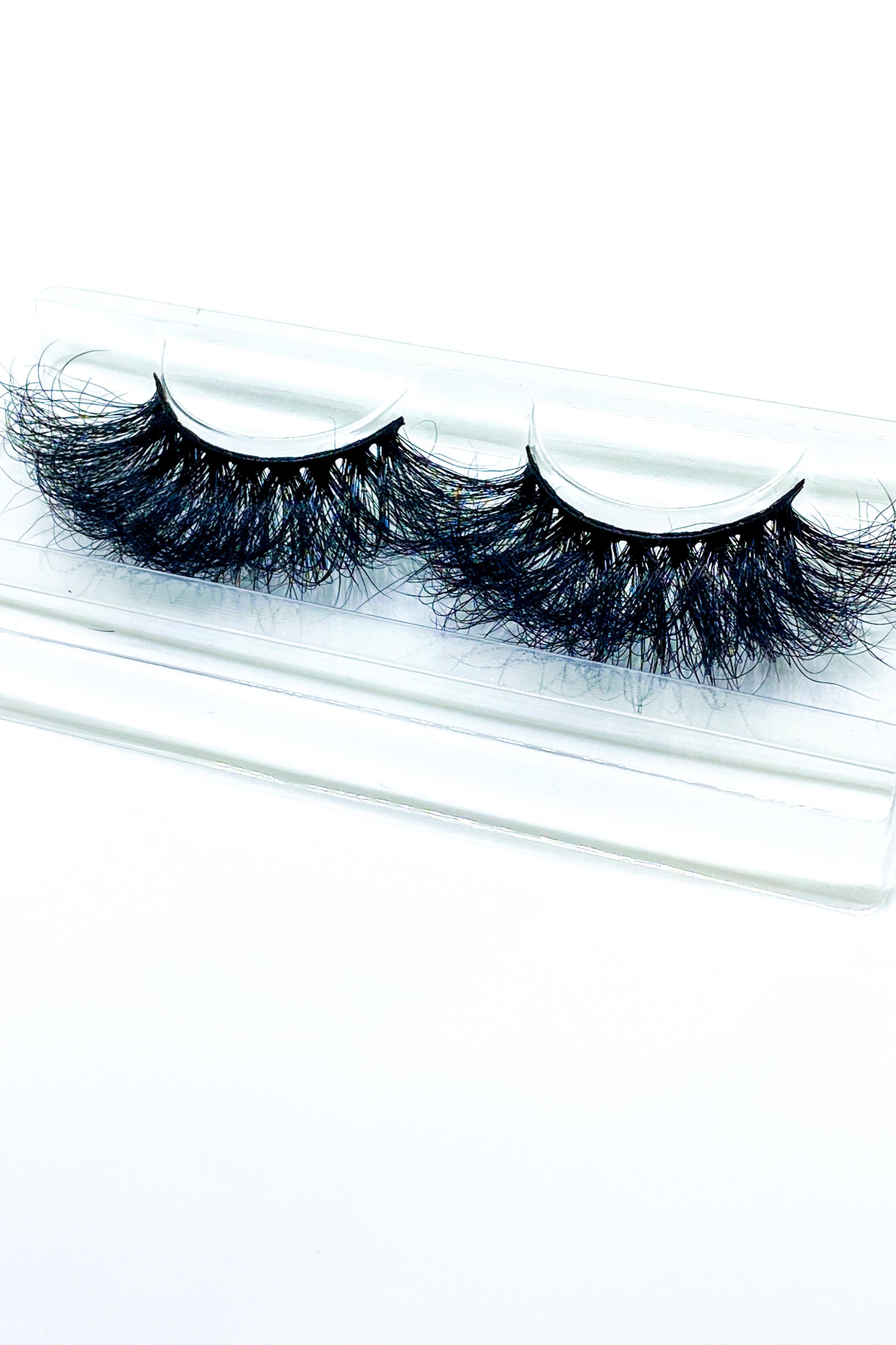 Lash Bae Boom Kack Pow 25mm Mink Strip Lashes, showcasing their voluminous and handmade quality.