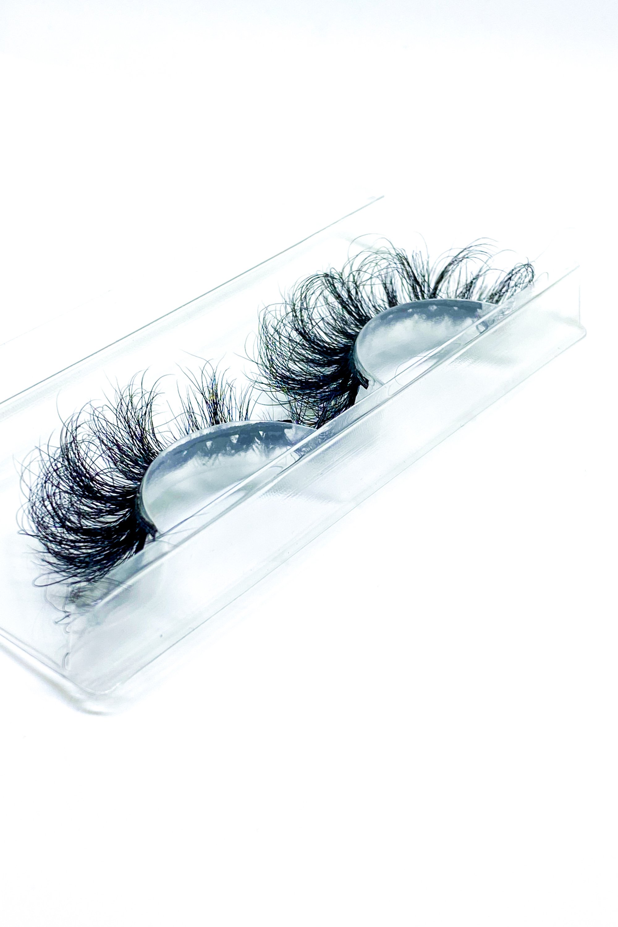 Lash Bae Moola Baby 25mm 3D Mink Full Volume Strip Lashes displayed elegantly, showcasing their luxurious design and quality.