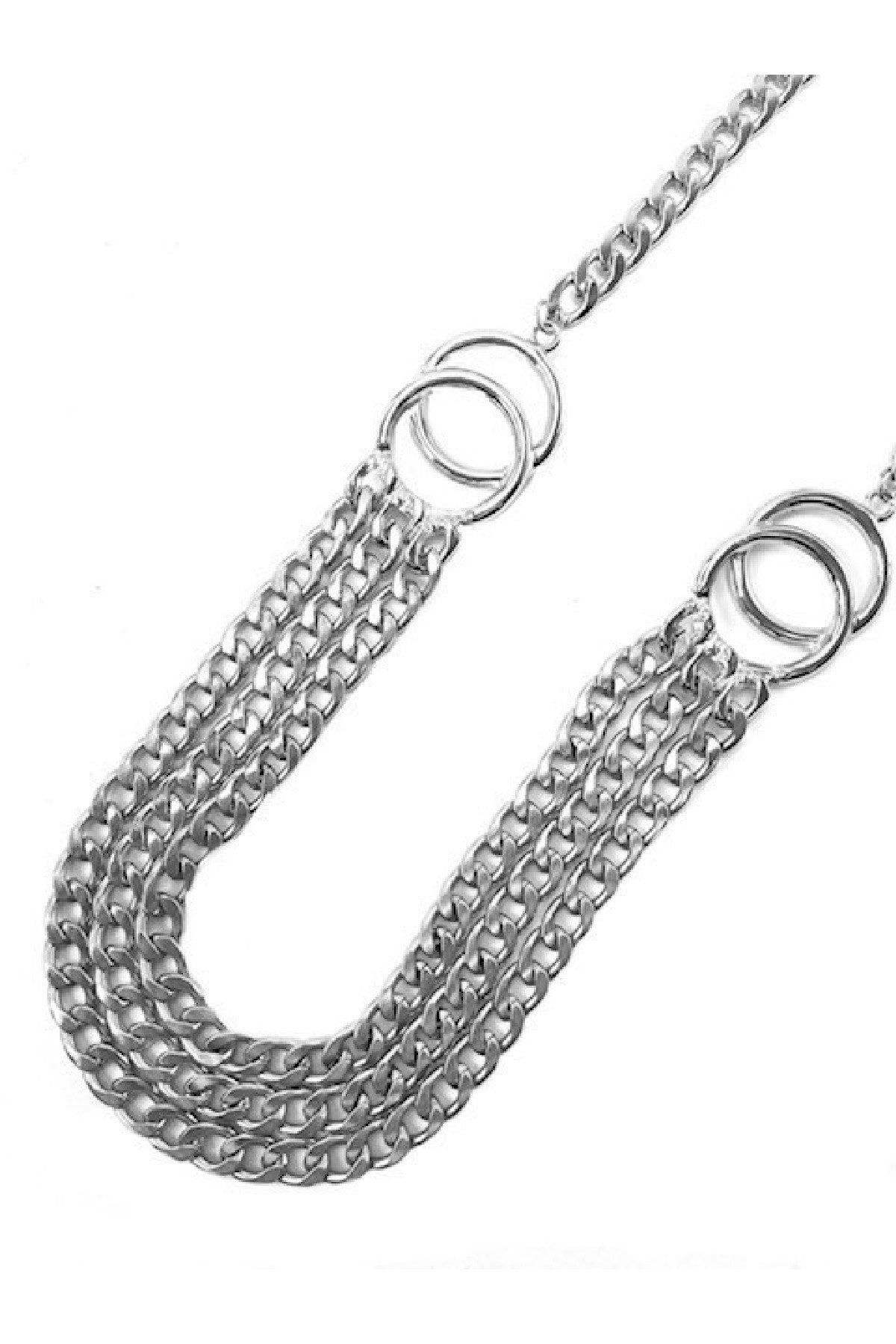 A stylish layered chain belt featuring a lobster claw clasp and an extender, perfect for enhancing outfits.