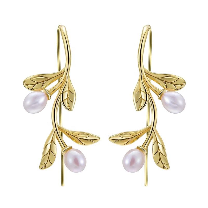 Elegant Leaf and Pearl Earrings featuring a delicate leaf design and lustrous pearls, perfect for any occasion.