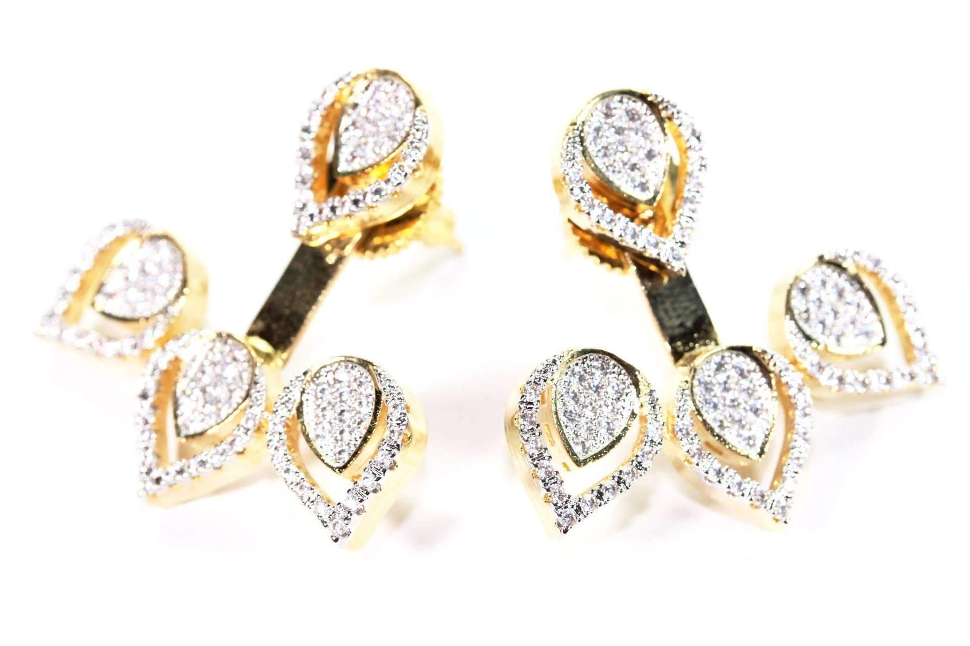 Goldtone leaf design jacket earrings with pave detailing, showcasing elegance and sparkle.