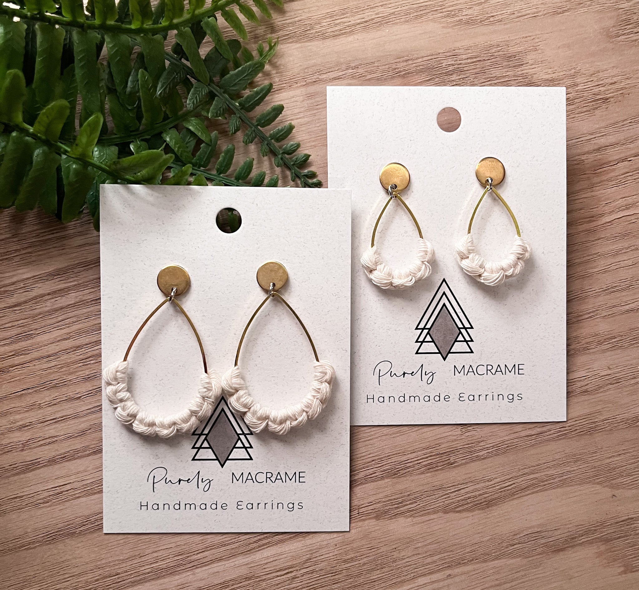 A pair of matching earrings designed for mothers and daughters, featuring one small and one larger pair, lightweight and made from lead-free materials.