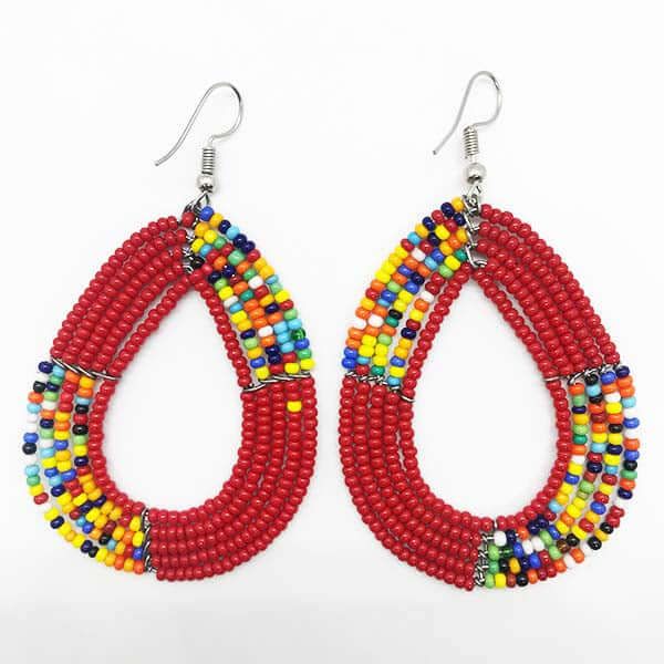 A pair of Maasai beaded earrings featuring vibrant wine red African seed beads in an elegant oval shape.