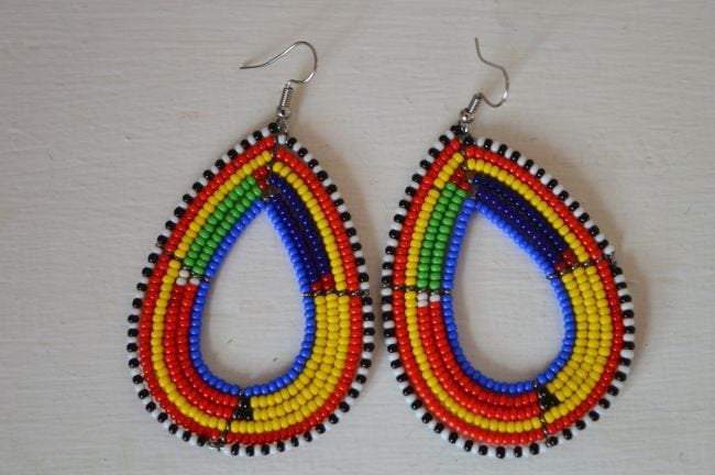 Handcrafted Masai Beads Drop Earrings featuring vibrant colors and unique designs, perfect for any occasion.