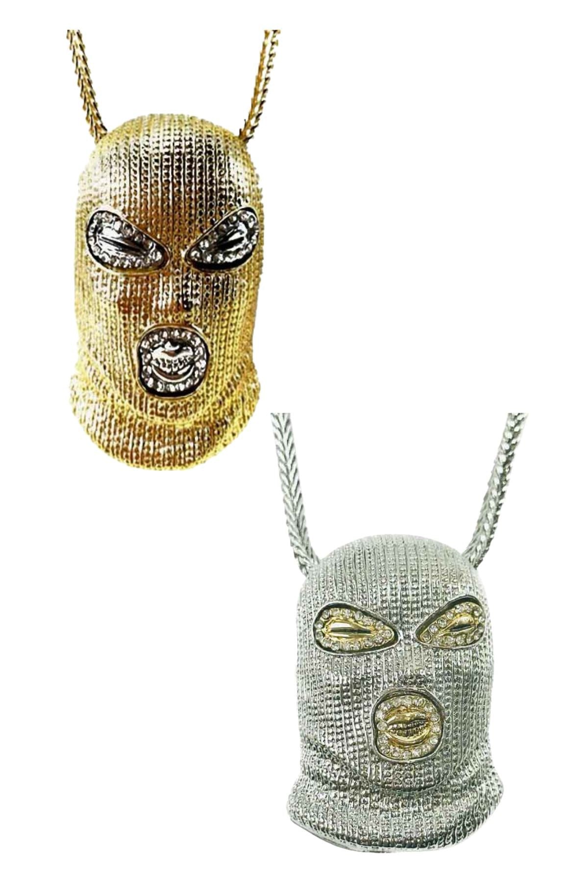 A stylish MASK PENDANT NECKLACE featuring a unique mask design, approximately 23 inches long with a pendant size of 2.1/8" x 3".