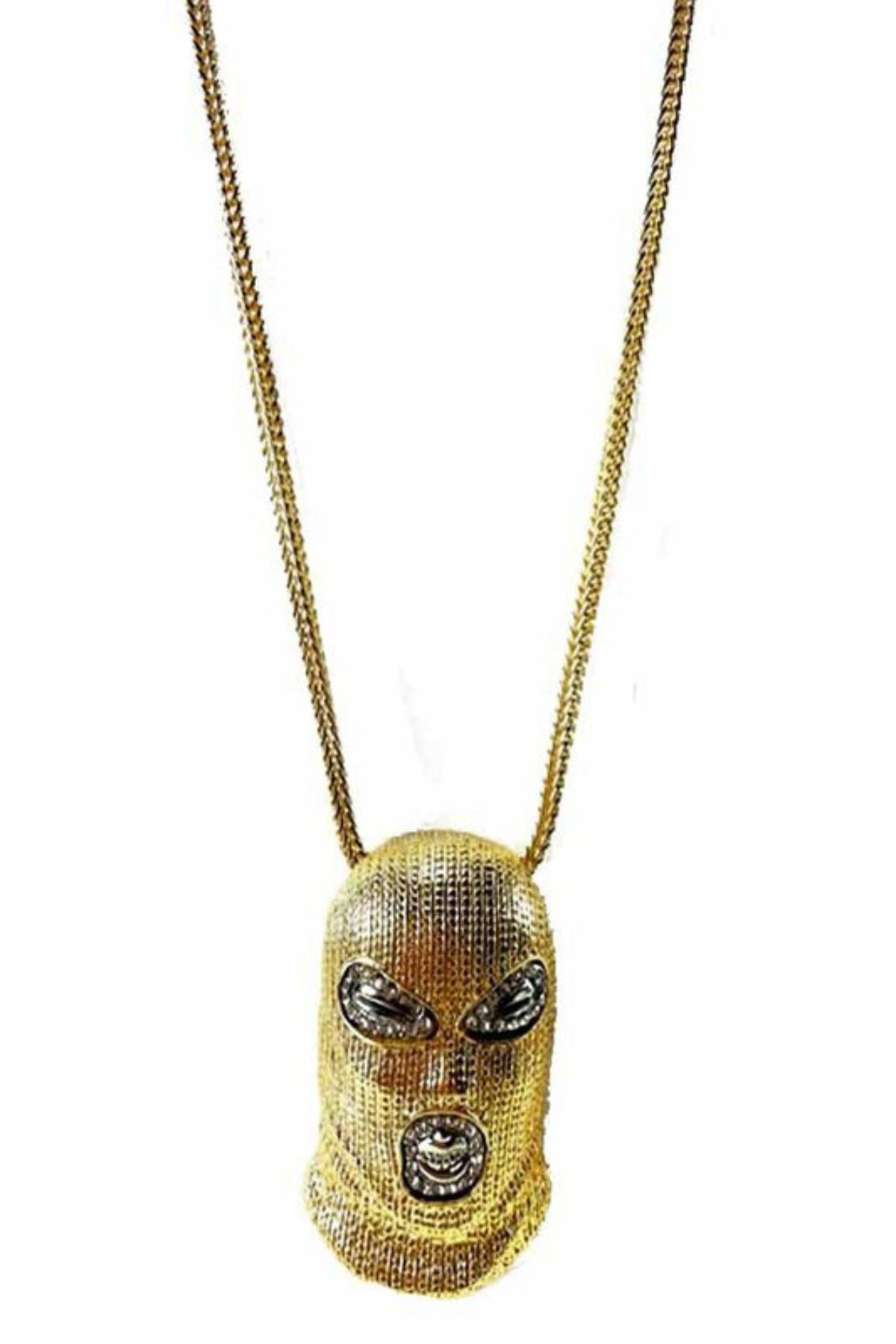 A stylish MASK PENDANT NECKLACE featuring a unique mask design, approximately 23 inches long with a pendant size of 2.1/8" x 3".