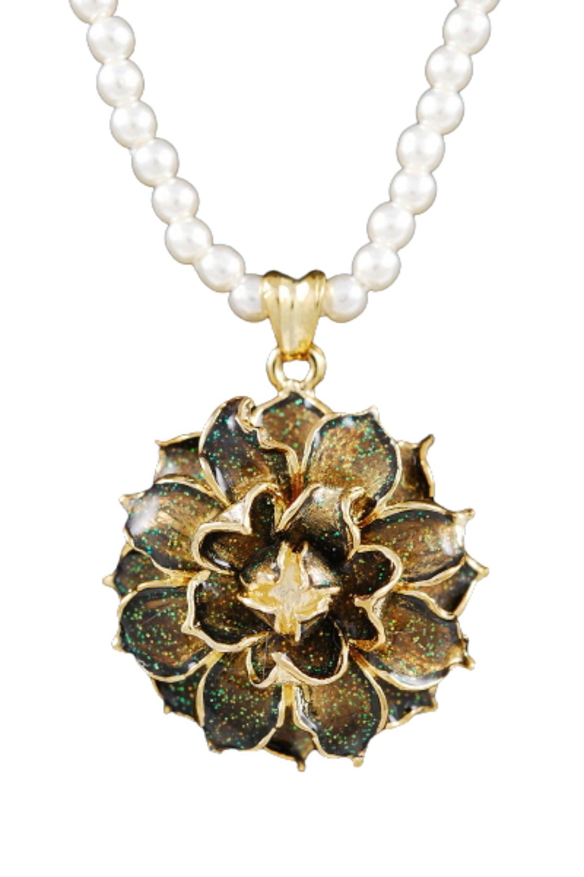 A stylish metal flower pendant necklace with a 31-inch chain and lobster claw clasp, featuring a delicate floral design.