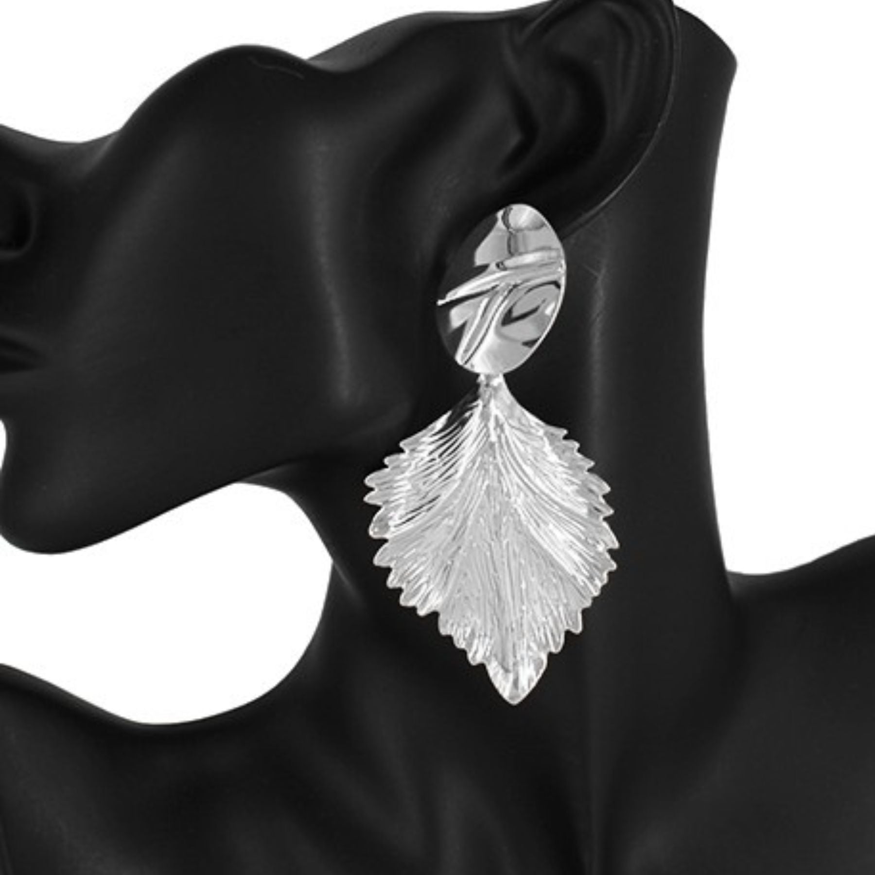 Elegant metal leaf shape post earrings with a stylish design, perfect for any occasion.