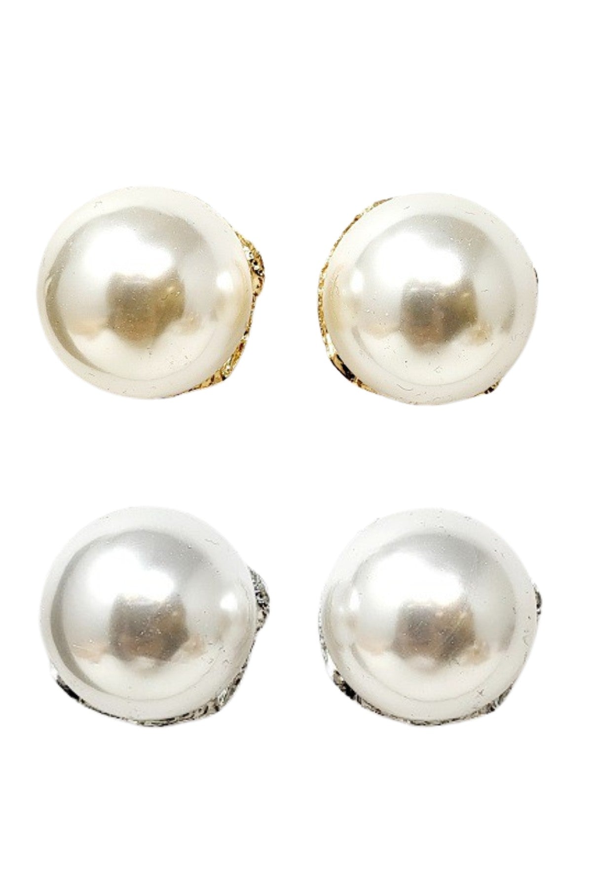 Elegant metal clip earrings featuring a large pearl centerpiece, perfect for any occasion.