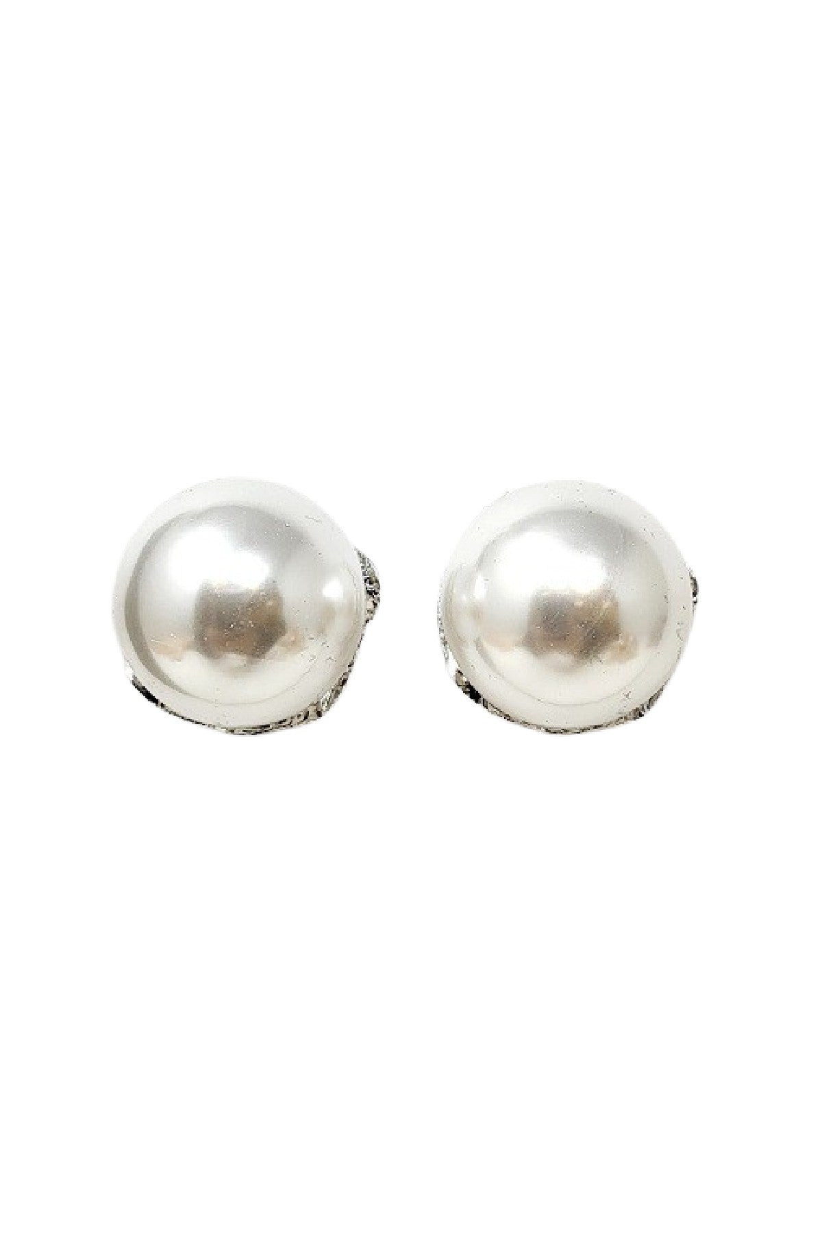 Elegant metal clip earrings featuring a large pearl centerpiece, perfect for any occasion.