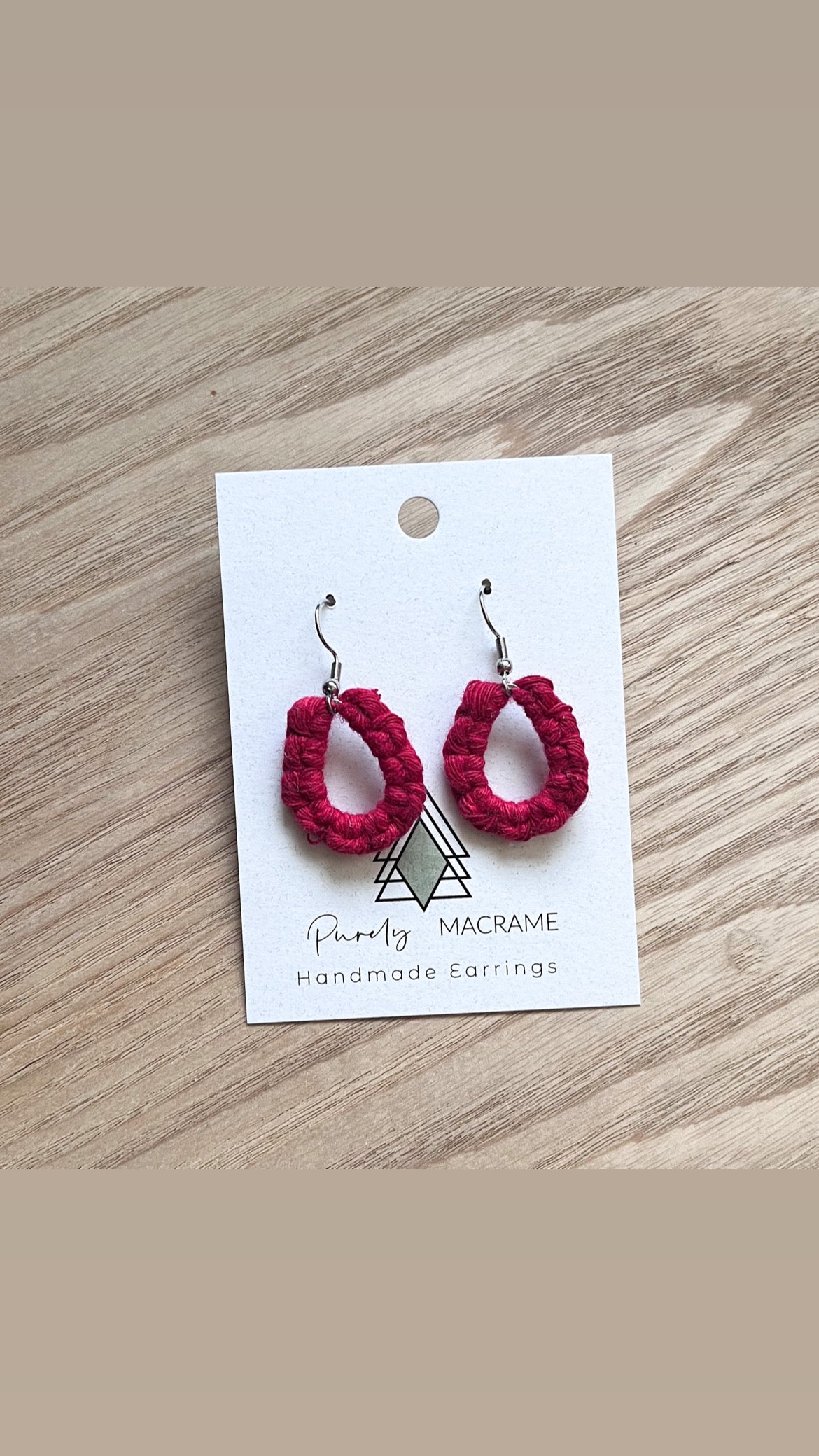 A pair of lightweight Mini Teardrop earrings made from 100% macrame cotton, available in various colors.