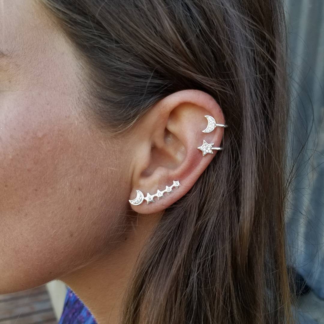 Moon & Star Earring and Cuff Set featuring two cuffs and one crawler, designed for an asymmetrical look with sparkling crystals.