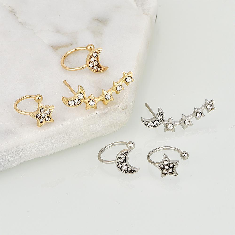 Moon & Star Earring and Cuff Set featuring two cuffs and one crawler, designed for an asymmetrical look with sparkling crystals.