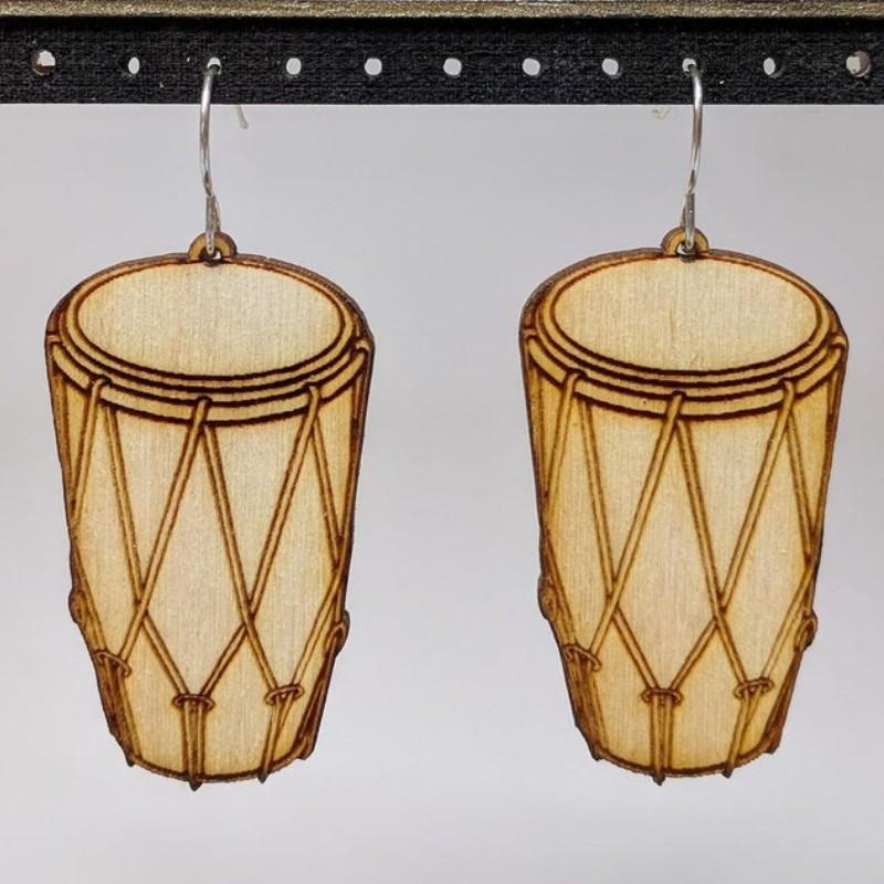 A pair of lightweight wooden earrings shaped like various musical instruments, including guitars and drums, with sterling silver ear wires.