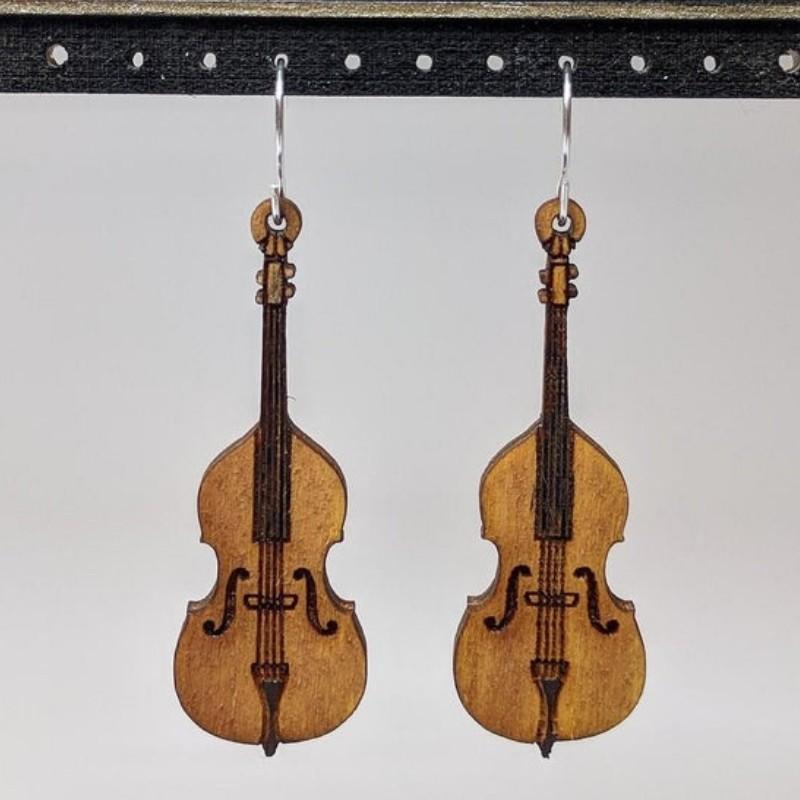 A pair of lightweight wooden earrings shaped like musical instruments, featuring intricate designs and sterling silver ear wires.