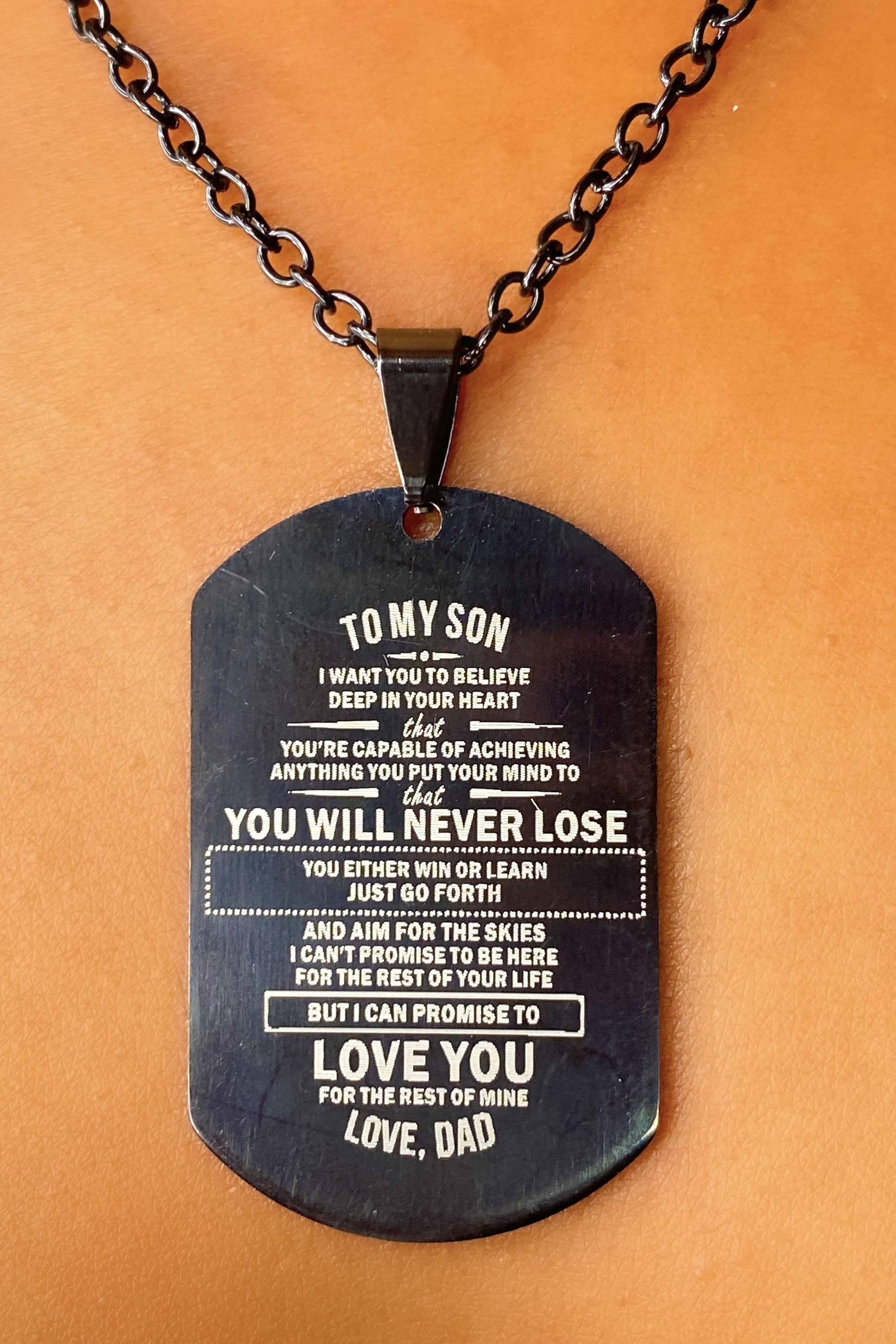 Dog tag necklace with heartfelt message.