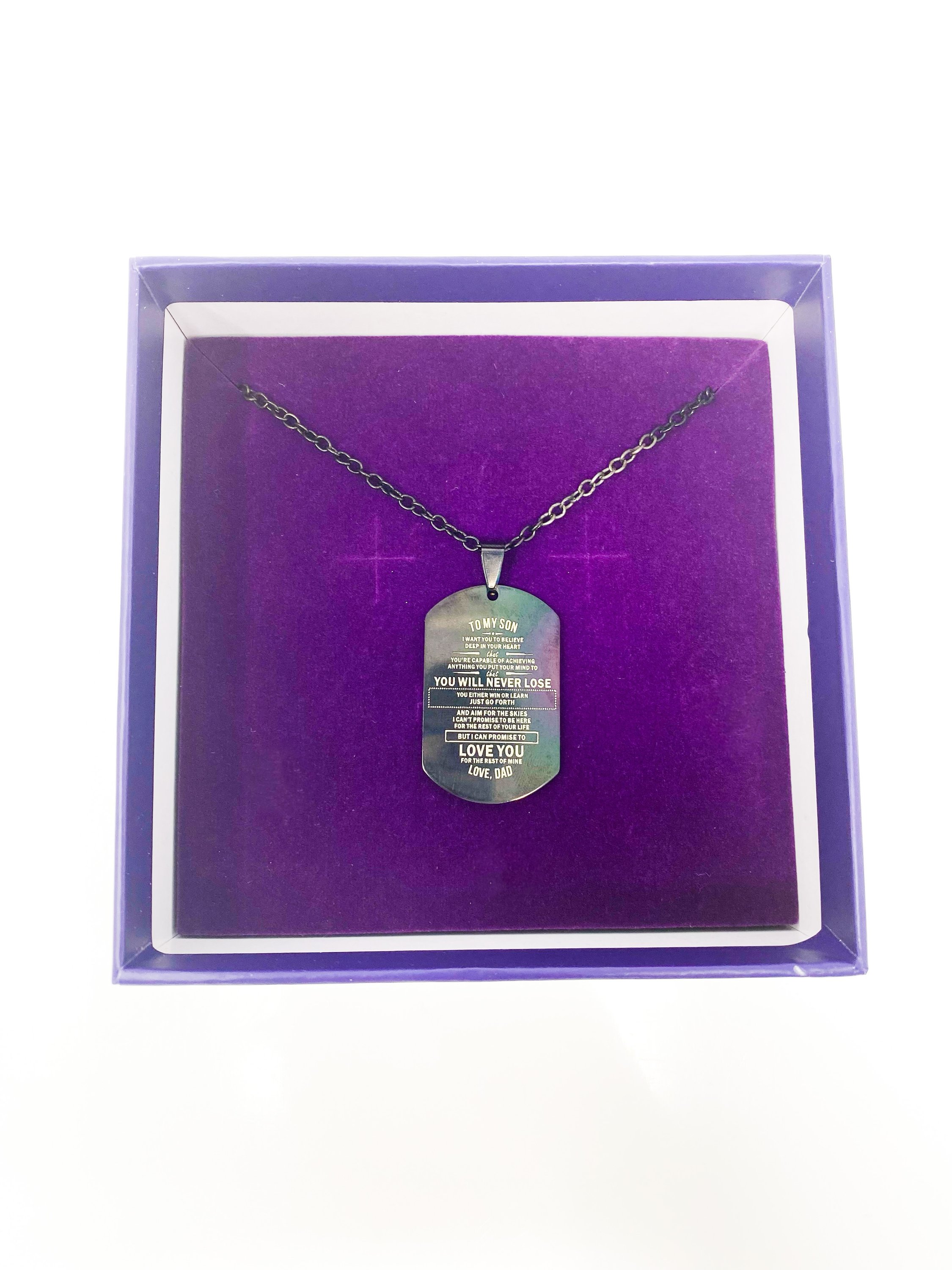 Necklace with engraved message.