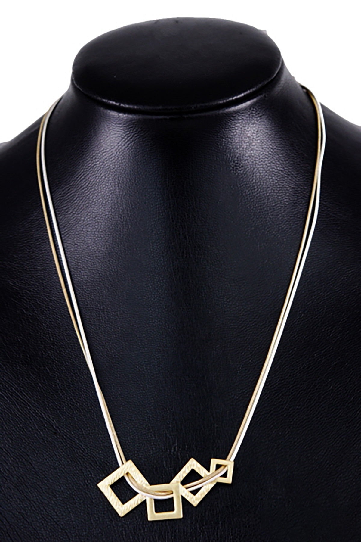 Cut out square link pendant necklace with double metal chains, featuring a lobster claw clasp and extender, elegantly displayed.