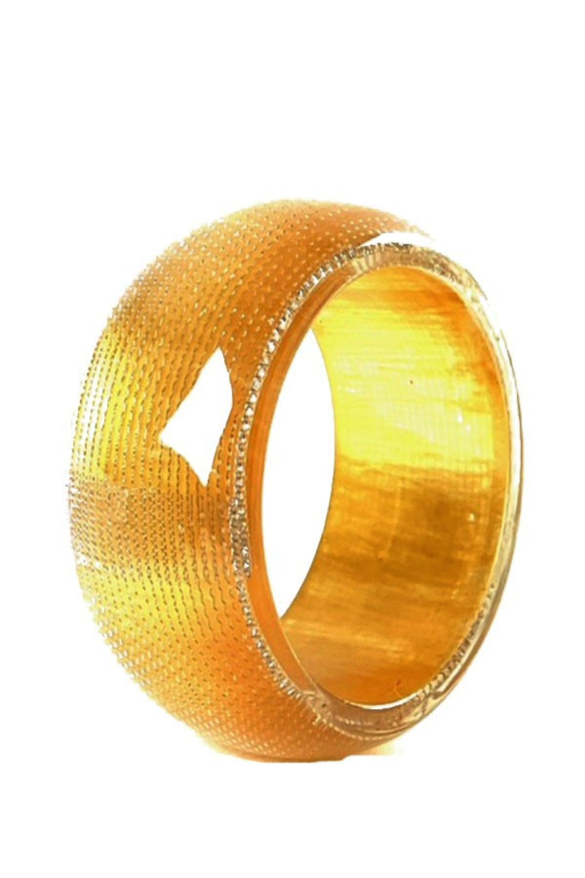 A colorful patterned plastic bangle with a 3-inch diameter, showcasing a stylish design suitable for various outfits.