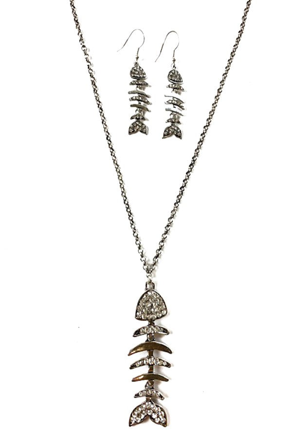 Elegant crystal fish bone pendant necklace and earrings set, showcasing intricate design and quality craftsmanship.