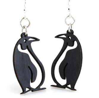 A pair of cute laser-cut wooden penguin earrings in Black Satin color, featuring hypoallergenic stainless steel ear wires.