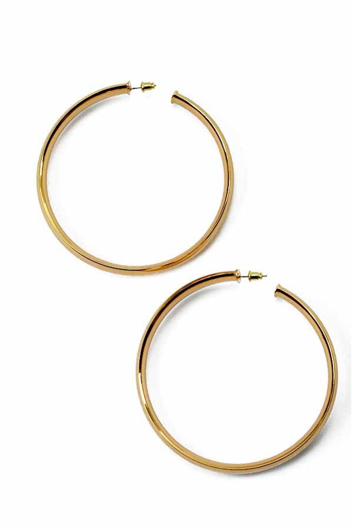 A pair of elegant plain thick hoop earrings with a 4-inch diameter, showcasing a shiny finish and secure post back closure.